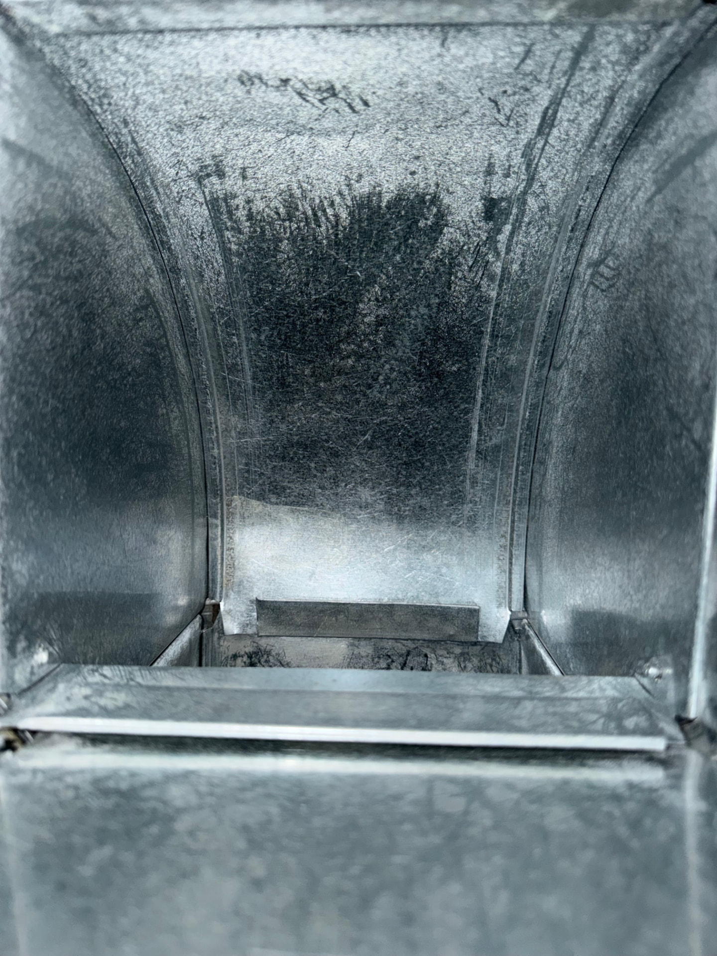 Air Duct Cleaning after Ridgeline cleaning — Dust-caked trunk line